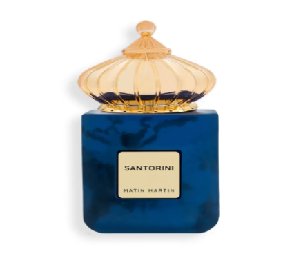 A bottle of Santorini EDP 100ml by Matin Martin with a blue marbled design and a gold-colored cap.