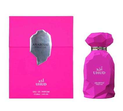 Pink Arabiyat Prestige Uhud perfume bottle and packaging on a white background