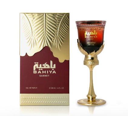 Bahiya Garnet perfume bottle and packaging on a white background