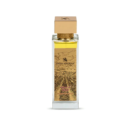 Swiss Arabian Extrait de Parfum in a clear rectangular glass bottle with a gold cap and a gold label featuring a vineyard illustration, on a white background.