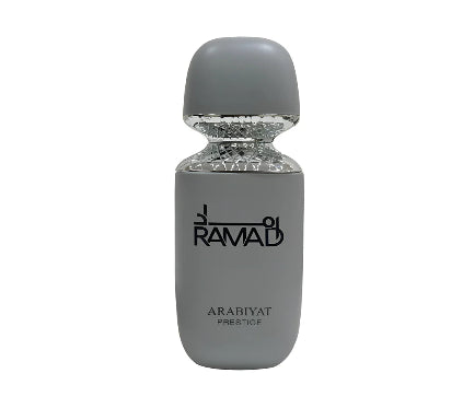 Gray perfume bottle with 'Arabiyat Prestige' branding on a white background