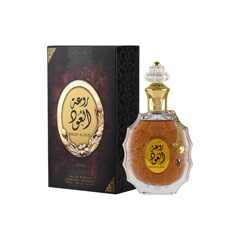 Perfume bottle and packaging with gold and black design on a white background
