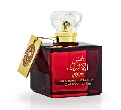 Red perfume bottle with gold cap and tag on a white background