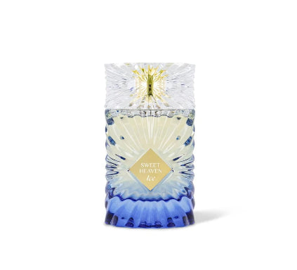 Decorative candle with a blue and white design on a white background