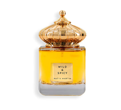 Perfume bottle labeled 'Wild & Spicy' by Matin Martin on a white background