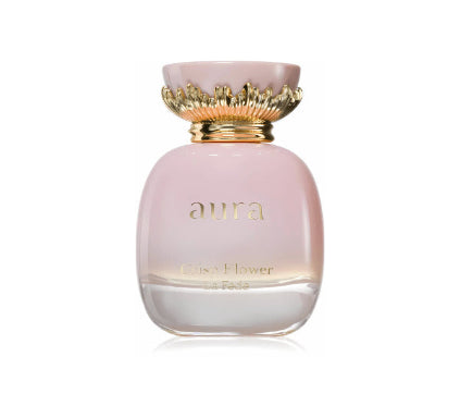 Pink perfume bottle with gold cap labeled 'aura' on a white background