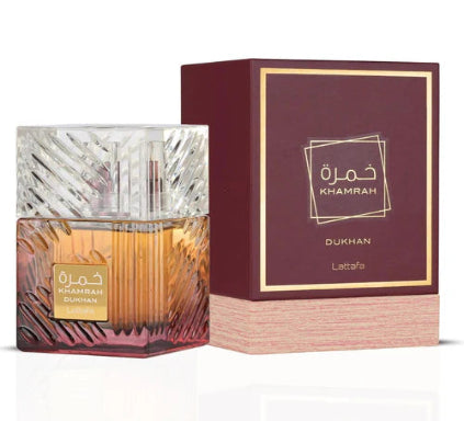 Khamrah Dukhan perfume bottle and packaging on a white background