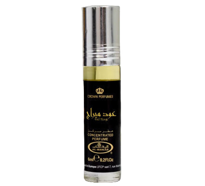 Perfume bottle with black label and gold accents on a white background