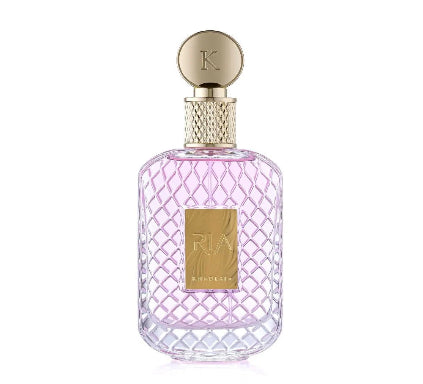Perfume bottle with pink lattice design and gold cap on a white background